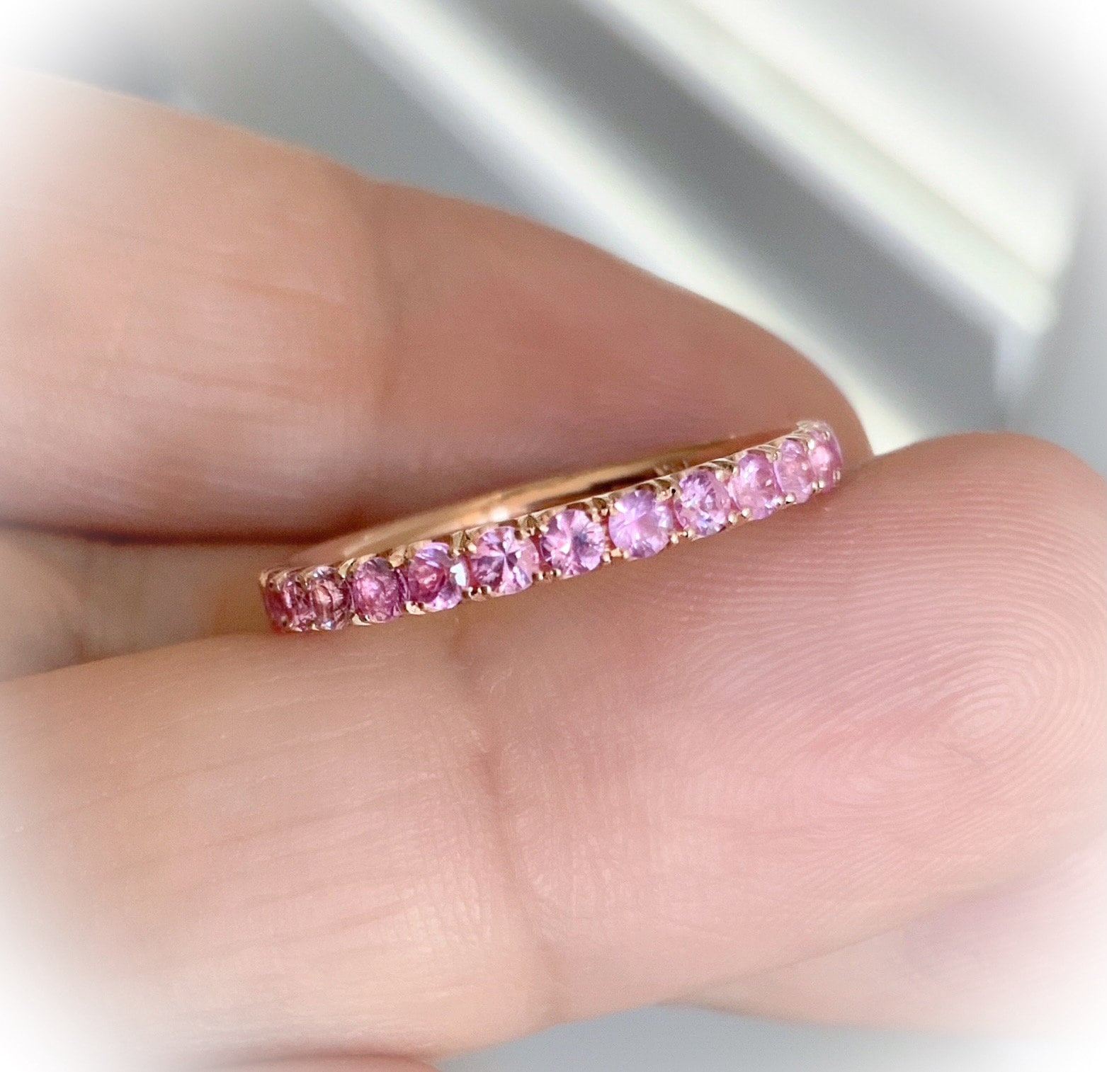 Pink sapphire half eternity ring online