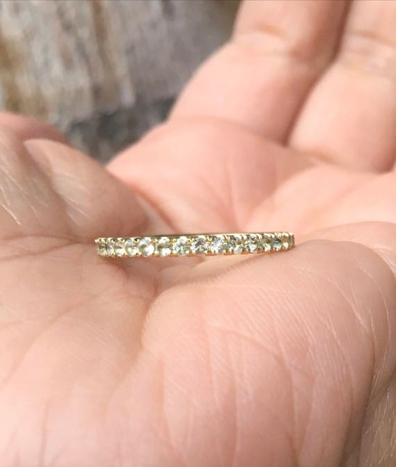 Green sapphire eternity ring clearance