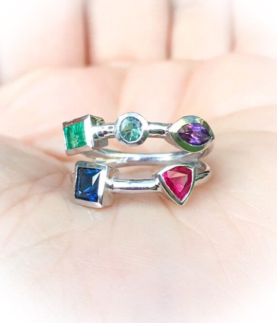 Bague familiale 5 pierres sale