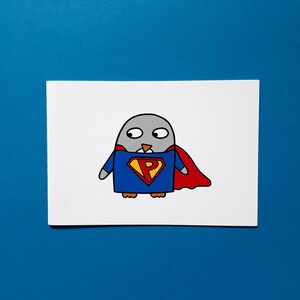 May include: A cartoon illustration of a gray penguin dressed as a superhero. The penguin wears a blue suit with a yellow and red emblem and a red cape. The background is a solid blue.