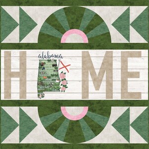 May include: A decorative quilt with a geometric design featuring the word "HOME" in tan block letters. The letter "O" is replaced with a map of Alabama, with the word "Alabama" above it. The quilt has green, white, pink, and tan accents.