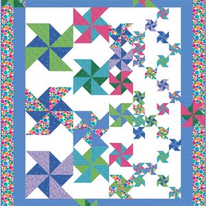 Puede incluir: Un edredón colorido con un diseño de molinillo. El edredón presenta varios tonos de azul, verde, rosa y morado. El borde es una mezcla de lunares multicolores. El edredón es un diseño de patchwork.