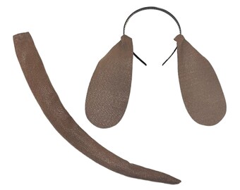 Puede incluir: Diadema de orejas de perro de fieltro marrón con banda elástica negra y cola de fieltro marrón.
