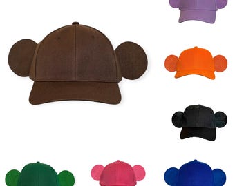 Mix en match baseballpetten met apen- en gorillaoren voor Halloween, geschikt voor volwassenen en kinderen. Verkrijgbaar in diverse kleuren: blauw, rood, roze, zwart, paars en groen.