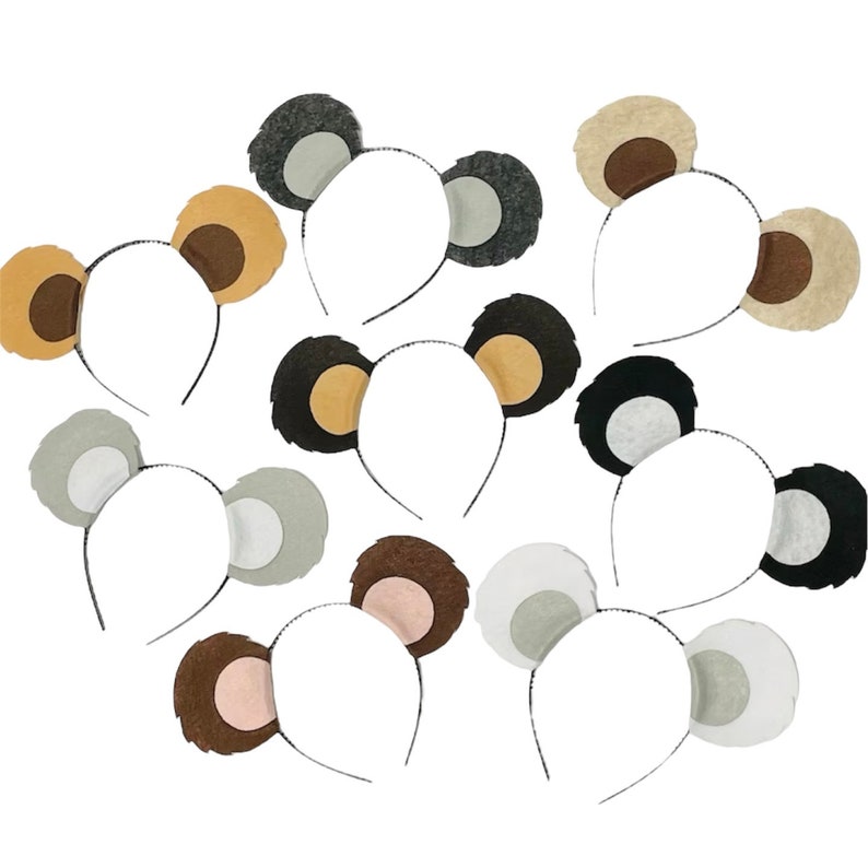 May include: Set of ten felt animal ear headbands. The headbands are black, brown, and gray with felt ears in various colors, including brown, gray, and white.