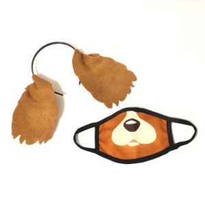 May include: A brown felt dog face mask with black elastic ear loops and a matching headband with felt ears.