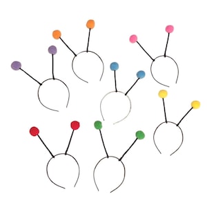 May include: A collection of colorful antenna headbands. Each headband has a thin black wire extending upwards, topped with a small, round pom-pom in various colors, including purple, orange, pink, blue, green, red, and yellow.