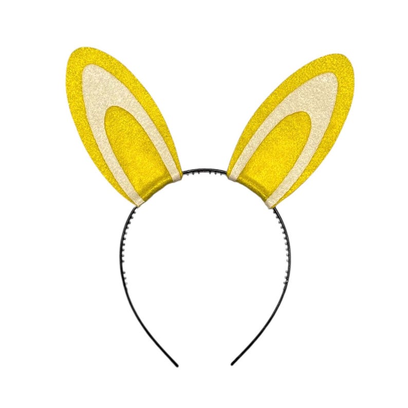 Puede incluir: Una diadema con orejas de conejo amarillas y blancas brillantes. Las orejas son amarillas con una secci&oacute;n interior blanca y est&aacute;n unidas a una diadema de pl&aacute;stico negro. Ideal para Pascua o disfraces.