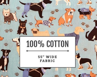 May include: A blue and white fabric with a repeating pattern of dogs wearing different outfits. The fabric is 100% cotton and 55 inches wide. The text "100% COTTON" and "55" WIDE FABRIC" is printed on the fabric.