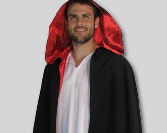 Large black cloak lined in red satin. Full hood