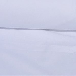 May include: A close-up of a white fabric with a subtle texture. A horizontal seam or fold creates a darker line across the image. The overall impression is of a smooth, clean surface.