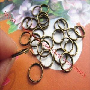 Vente en gros 100 porte-clés/anneaux de saut en bronze vieilli de 10 mm - double - solide