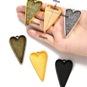 Bandejas colgantes con bisel de corazón: plata antigua, bronce, oro (compatible con cabujón de 42 x 25 mm) - 20 piezas