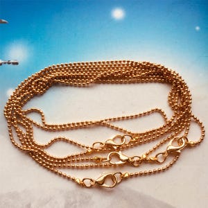 1,5 mm tjocklek 50 st kc guld 18 tums kulkedja halsband med karbinspännen