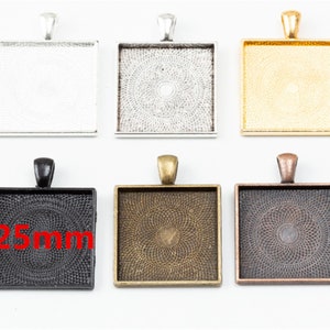 May include: Six square pendant trays in different finishes: silver, gold, bronze, and black. Each tray measures 25 mm and has a textured surface.