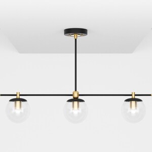 Helderglazen bol lineaire kroonluchter hangende armatuur Maximalist Mid Century Modern plafondverlichting binnen UL vermeld SIOUX Black & Brass