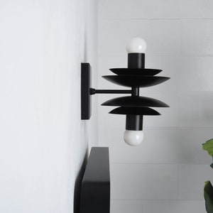 2 Light Bardwell wall sconce in black by Illuminate Vintage