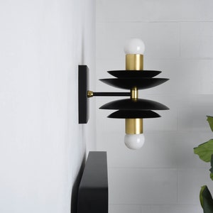 2 Light Bardwell wall sconce in black and brass by Illuminate Vintage