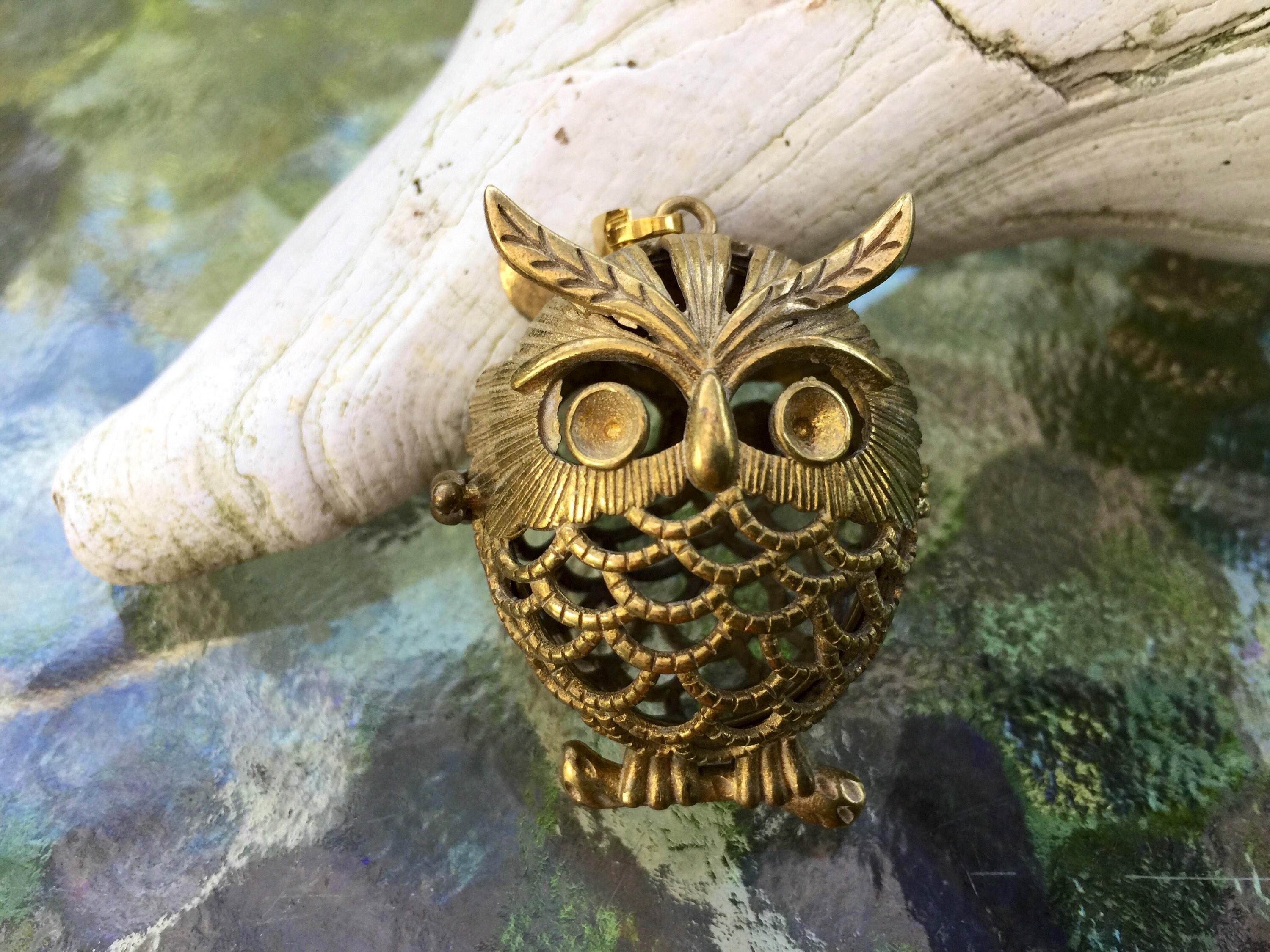 Large owl shape solid brass cage pendant: color may range from copper to bronze not polished or trea