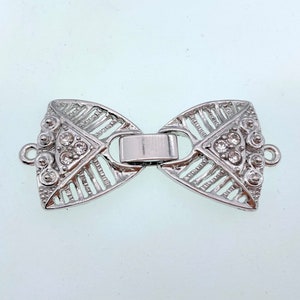 1 strand watch buckle /fold over clasp. (WB44) Silver/Gold plated metal with few rhinestones, Good for necklace or bracelet. New Arrival!