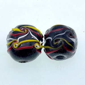 2 PC hand made lamp work glass beads, black color with red, yellow and white swirl stripes 20x20mm (3/4x3/4inch) great for DIY jewelry