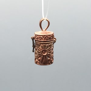 Small Solid brass cage pendant: color may range from copper to bronze. not polished or treated. Cylinder shape. (Bead not included)