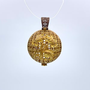 Solid brass cage pendant: color may range from copper to bronze, Not polished or treated. Flat round. Two sizes available (Bead not include)