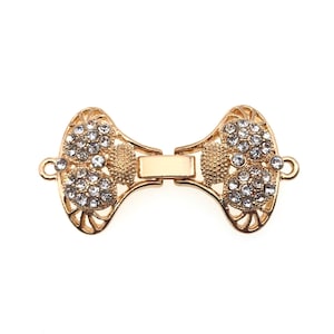 1 strand plated metal with rhinestone watch buckle or fold up clasp, easy on and off, 1 x 1 1/2 inch. (WB1)