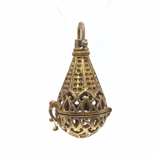 Solid brass cage pendant: color may range from copper to bronze. not polished/treated. Tear drop shape. Fit up to 16mm bead NOT included.