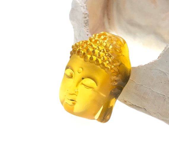 Glass buddha best sale pendant