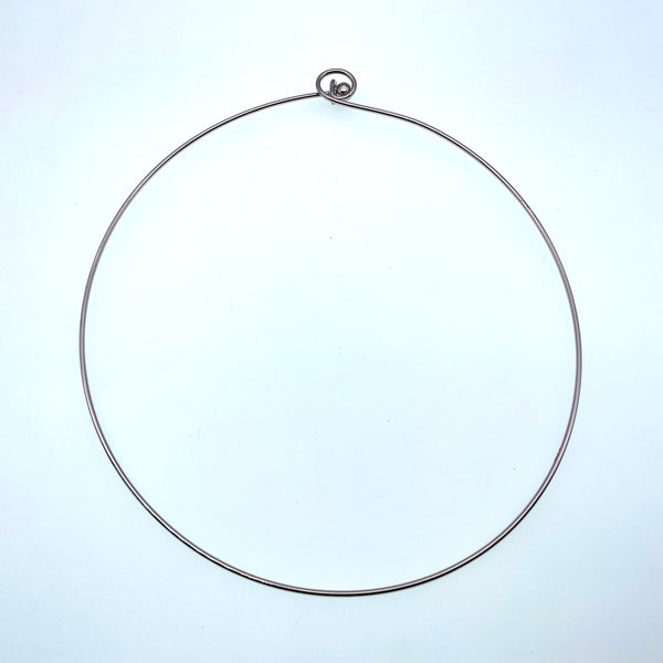 Silver plated round metal wire choker necklace: about 17.5”  long, 1.5 mm thick, end ball screws off for pendant/beads, end loop add tussle