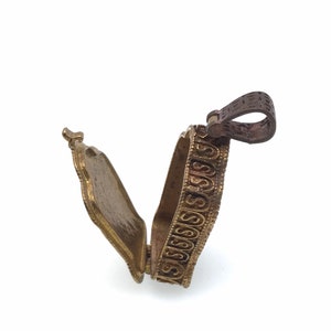 Solid brass Tibetan Buddhism locket pendant, color may range from copper to bronze “Gathering 10 powerful elements”, 1 3/4 x 1&quot;, no polish