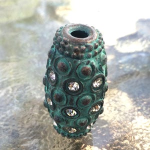 Contas de cilindro de pátina com strass (1 1/4 x 1/2 polegada)
