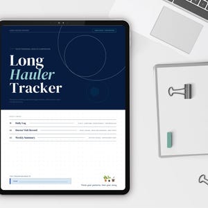 May include: A digital tablet displays the words "Long Hauler Tracker" in white and teal against a dark blue background. A notebook with a binder clip and a keyboard are also visible on a white surface.