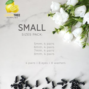 May include: A set of black plastic safety eyes for crafts. The set includes four pairs of eyes in each of the following sizes: 5mm, 6mm, 7mm, and 8mm. The text "SMALL SIZES PACK: 5mm. 4 pairs 6mm. 4 pairs 7mm. 4 pairs 8mm. 4 pairs 4 pairs = 8 eyes + 8 washers" is printed on a white background.