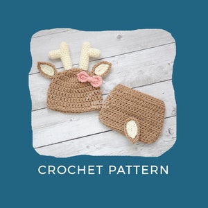 May include: Crochet pattern for a brown deer hat and matching diaper cover with white antlers and a pink bow.  CROCHET PATTERN is written in white text on a blue background.