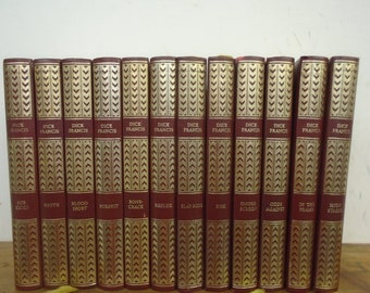 Set of 12 Dick Francis Vinyl covered books by Heron Books.