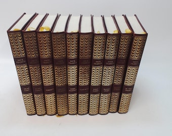 Set of 21 Dick Francis Vinyl covered books by Heron Books.