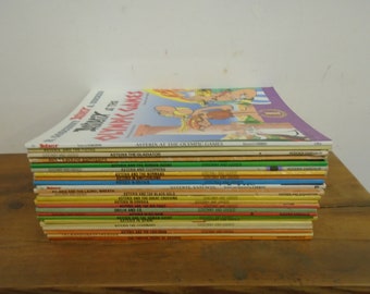 Set of 24 Paperback Asterix books.  Mostly VG condition,