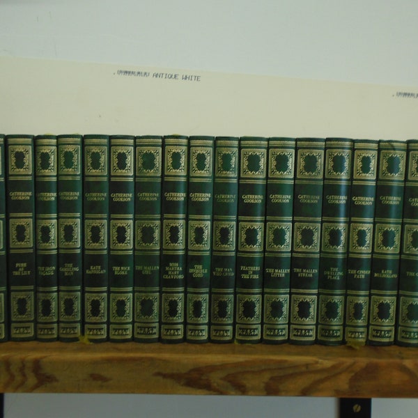 Set of 19 Catherine Cookson Vinyl covered books by Heron Books.