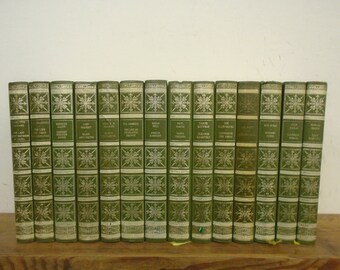 Set of 14 Women Who Made History Books. Vinyl covered books by Heron Books.