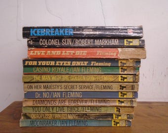 Set of 12 Pan James Bond Books.- Mostly Raymond Hawkey Covers