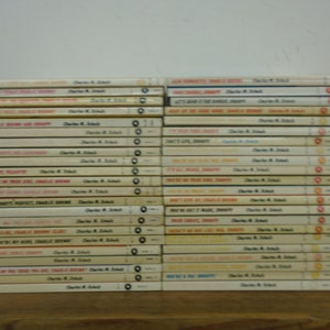 Job Lot Of 44 Peanuts Paperbacks. Charles Schultz, Coronet