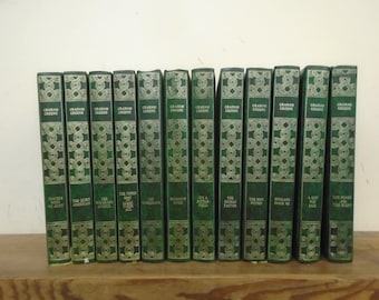 Set of 12 Graham Greene Vinyl covered books by Heron Books.