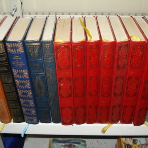 Set of 30 Vinyl covered books by Heron Books. Mixed colours & authors image 1