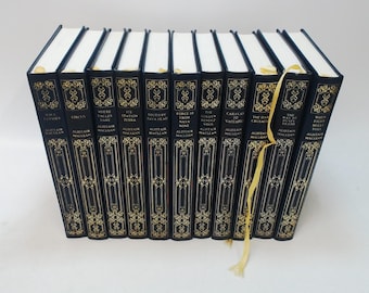 Set of 22 Alistair Maclean Vinyl covered books by Heron Books.