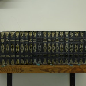 Set of 22 Mixed Authors. Vinyl covered books by Heron Books.