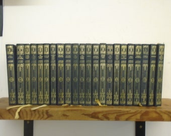 Set of 22 Alistair Maclean Vinyl covered books by Heron Books.