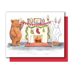 Tarjeta de felicitación navideña con escena de chimenea y conejito de oso