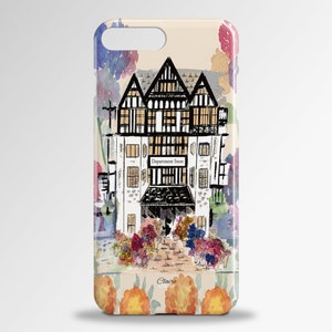 May include: A watercolour illustration of a building with a sign that reads "Department Store" on a phone case. The building is surrounded by flowers and the background is a light beige colour. The phone case has a floral design on the bottom and the text "Claire Louise" on the bottom centre.